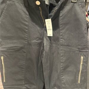 NWT White House Black Market Black Cropped Pants with Gold Zipper accents.